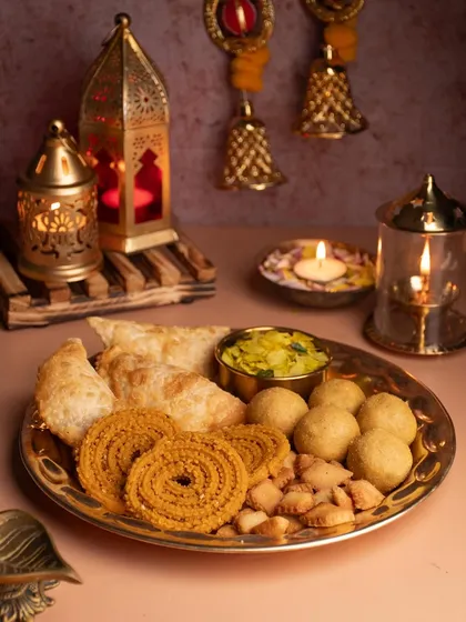 We capture the heart of festivals through food. This beautifully styled shot of a traditional Diwali faral platter, complete with diyas and lanterns, shows our ability to create content that feels authentic, warm, and festive.