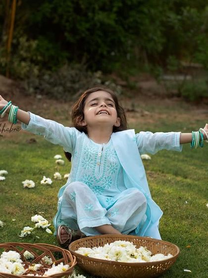 The pure joy of a little girl throwing flowers in the air. I encourage play and fun in my sessions to capture authentic expressions and childhood wonder.