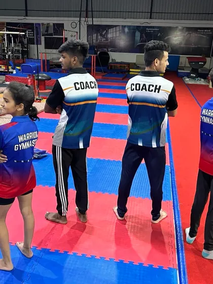 Our coaches and students are a team. We wear our Warrior Gymnastics colors with pride, representing a community built on discipline and mutual respect.