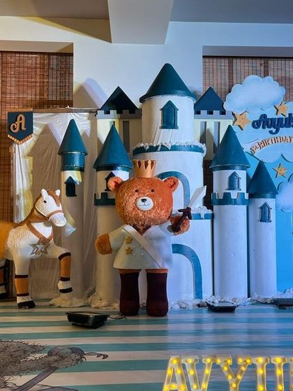 A close up of the teddy bear prince and his horse in the 3D castle themed setup, highlighting the detailed props.