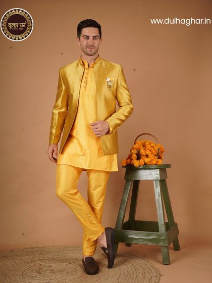 Haldi vibes, but make it royal. A bright yellow kurta set with a matching jacket, perfect for pre-wedding festivities.