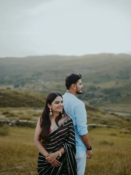A lovely portrait with the rolling hills of Udaipur in the background. The soft, natural light is perfect for creating flattering and romantic pre-wedding images.