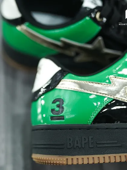 A close-up on the heel detail of the Bapesta Dubai edition, showing the '3' and BAPE branding.
