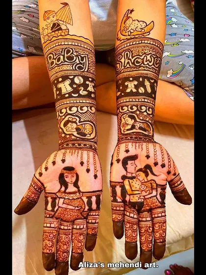 A full baby shower mehendi with portraits of the pregnant mother and the family. It's a beautiful way to capture this special time.