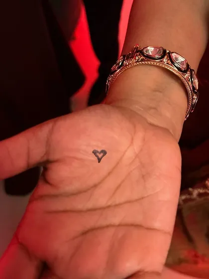 Look closer. Sometimes the most magical things are hidden in plain sight, like a heart that appears on someone's palm when they least expect it.