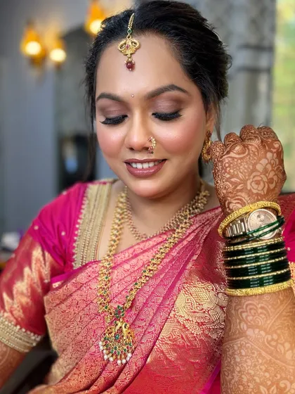 A close-up of the bride's makeup for her Tamil wedding ceremony. She wanted burgundy brown eyes, and the result was subtle yet so glamorous.