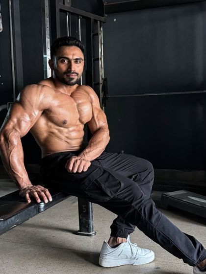 Current update. Posing on a bench in the gym.