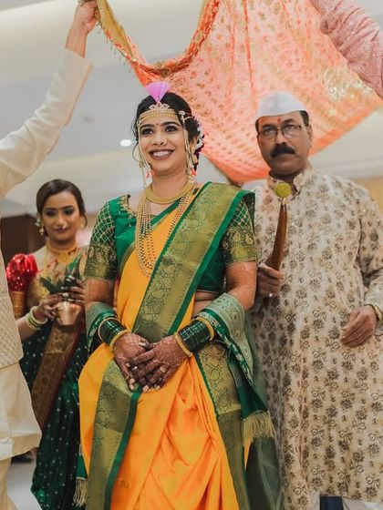 The bride's grand entrance, a significant moment in any wedding. We capture the anticipation and the beauty of the bride as she walks towards her new life.