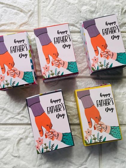 These mini matchbox-style photo holders were made for Father's Day. They slide open to reveal a small collection of 5 cherished photos.