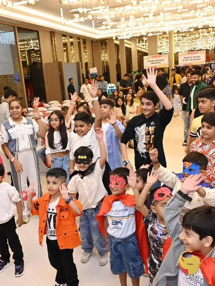 A whole team of little superheroes with their hands in the air, fully engaged in the party games. I work with hosts who know how to keep the energy high and get every child involved.