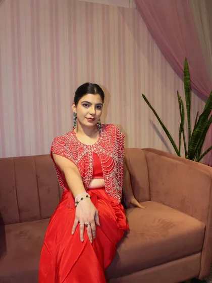 Another shot of me relaxing in the red draped skirt set. It's as comfortable as it is beautiful.