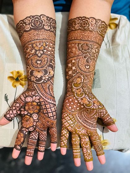 A classic Indian design with a mix of floral and paisley motifs. The coverage is full and the details are beautiful.