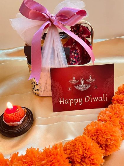 A close-up of our charming mini basket hamper, showing the detail in its wrapping and contents.