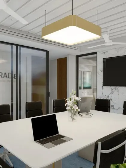 This rendering of a conference room for Paradise Electrical Industries showcases a professional and modern aesthetic, with a large central table, marble accent wall, and glass partitions for transparency.