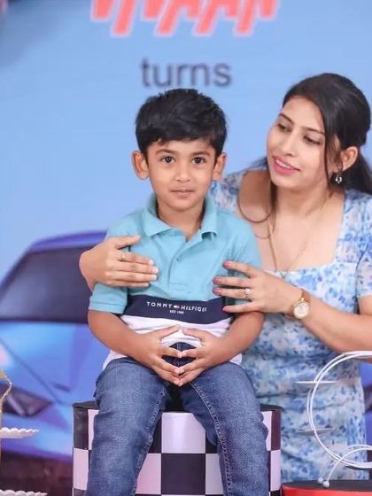 A vibrant 'Encanto' themed birthday party, with colorful floral decor, character cutouts, and a custom backdrop of the magical casita, bringing the magic of Colombia to your event.