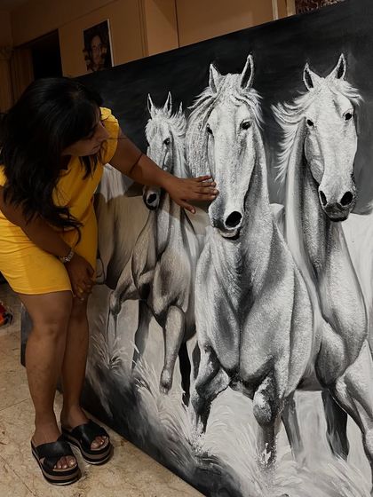 The texture of the sculpted horses adds a tactile dimension that makes the artwork feel dynamic and alive, as if they could gallop right off the canvas.