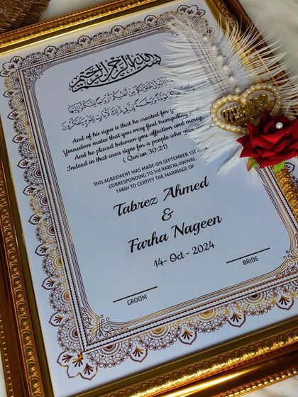 Another view of the gold-framed Nikah certificate, showing the beautiful border details and the custom feather pen. Every element is chosen to add to the beauty of your special day.