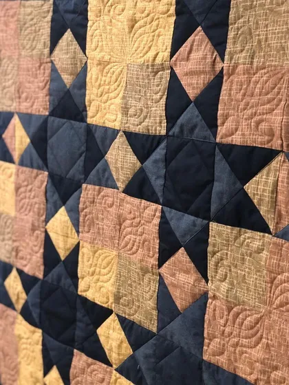 Another detail shot of the Sawtooth Star quilt.