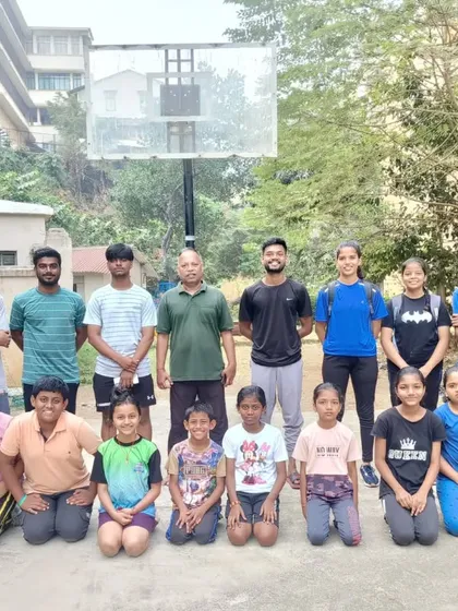 The full team of participants and coaches from one of our free training camp sessions. It's a joy to see the community come together for fitness and learning.