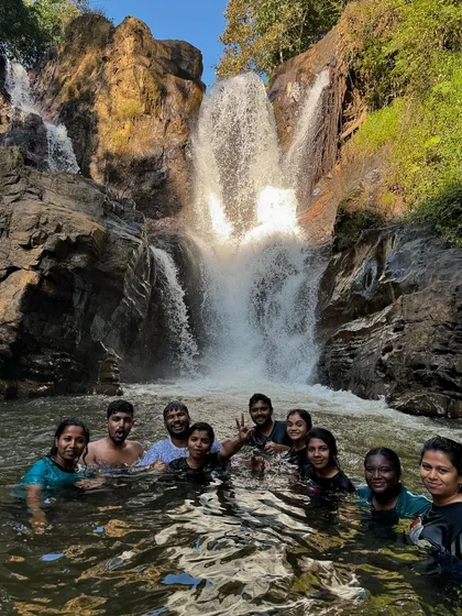 A perfect moment of bliss as our group enjoys a swim in the cool, clear waters at the base of a waterfall on our Bandaje trek.