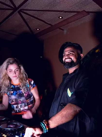 A fun moment with a fan on the dance floor at the Waikiki afterparty.