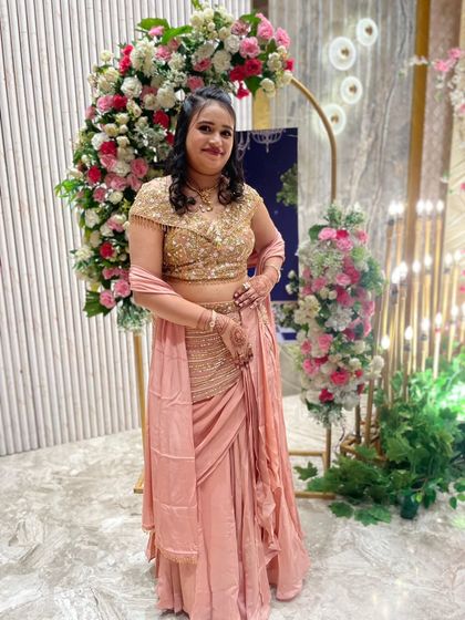Another beautiful look for our wonderful client, Neelam. This peach draped outfit with a golden embroidered blouse was perfect for the occasion. Her continued trust means everything.
