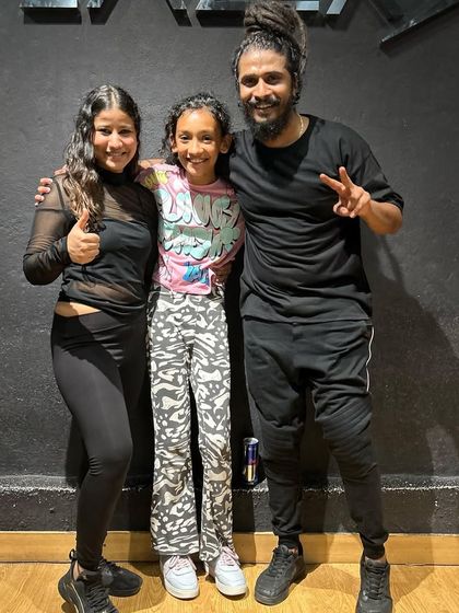 Capturing a fun moment with our guest instructors and a young dancer. Our classes are open to all age groups.