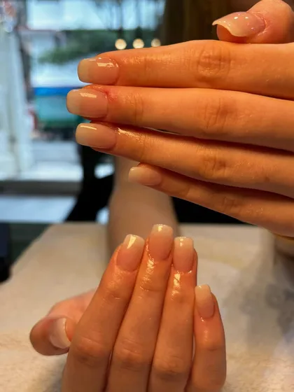 When in doubt, go for an Ombré French. Also known as baby boomer nails, this style features a seamless blend from a nude pink base to a soft white tip for a subtle and sophisticated look.