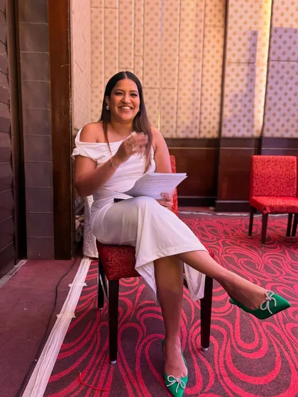 A candid, happy moment backstage. I genuinely enjoy the process and the energy of live events.