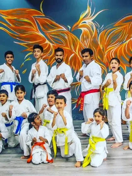 Our dojo is a family, open to everyone. This photo from our Kyu grading at the Marathahalli dojo shows students of all ages and belt levels, from young kids with yellow belts to experienced adults, all training together with focus and a lot of energy.