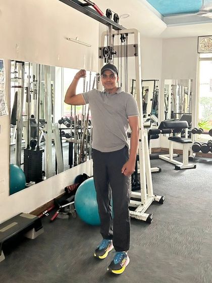 Flexing in the gym. Strength is a journey, not a destination.