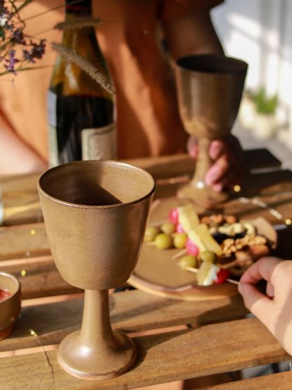 A close up of the elegant wine goblets from the 'Moments Together' collection, designed to celebrate shared moments over a favorite drink.