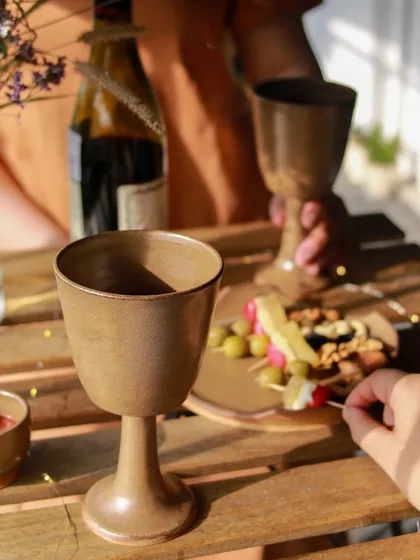 A close up of the elegant wine goblets from the 'Moments Together' collection, designed to celebrate shared moments over a favorite drink.