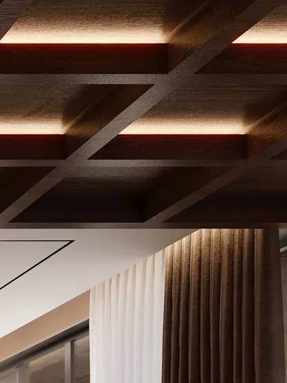 Another detail of the coffered ceiling, showing the geometric pattern and the soft glow of the hidden lights. This adds architectural interest and a warm ambiance.