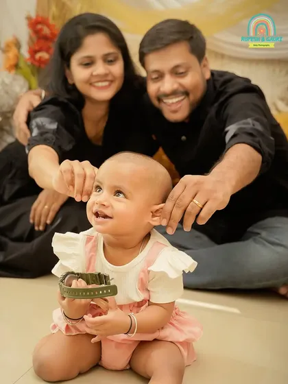 A playful moment during a family session. It's these unposed, candid interactions that often make for the most cherished photographs.