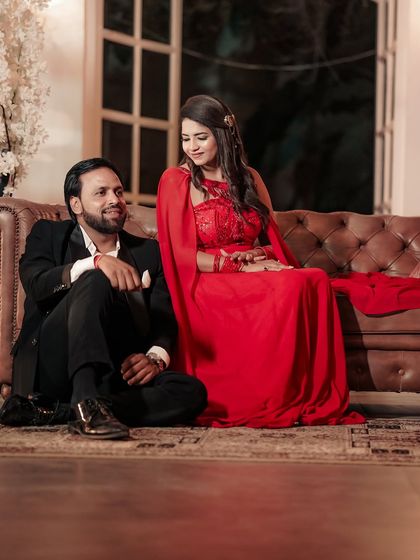 A sweet moment captured during the pre-wedding shoot. The makeup is flawless from every angle, ensuring the couple looks their best.