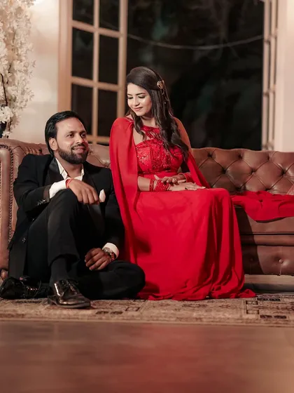 A sweet moment captured during the pre-wedding shoot. The makeup is flawless from every angle, ensuring the couple looks their best.