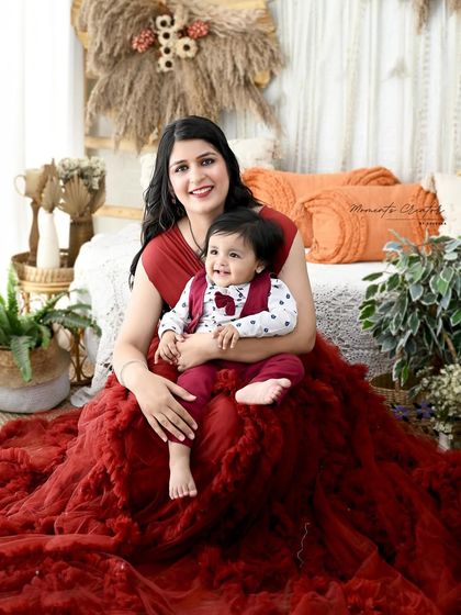 A sweet moment between a mother and her baby boy during his one-year milestone shoot. Her expression of love is what makes this photo so special.