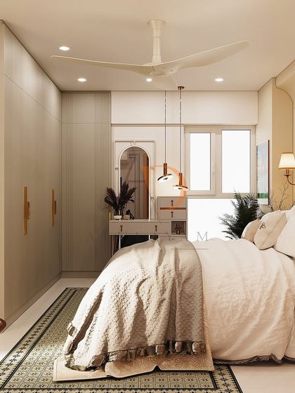 A serene bedroom with a classic carved headboard, soft neutral tones, and a dedicated vanity area with modern pendant lighting.