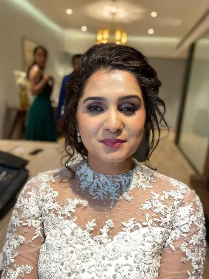 A beautiful Christian bride ready for her ceremony. The makeup is fresh and dewy with a soft shimmer on the eyes, creating a truly angelic look.