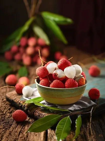 The challenge here was to capture the delicate, translucent texture of the lychee flesh. The soft lighting and shallow depth of field draw the viewer's eye directly to the fruit in the bowl.