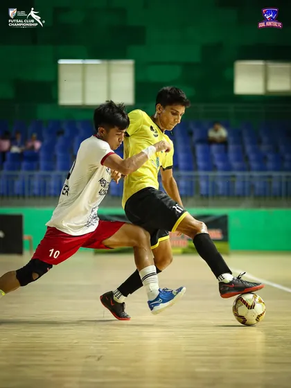 An intense battle for the ball during the semi-final match.