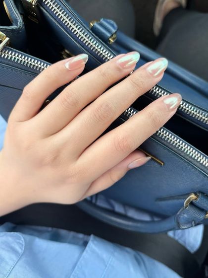 Pearly chrome nails with a jelly brandy rose base, creating a beautiful iridescent effect.