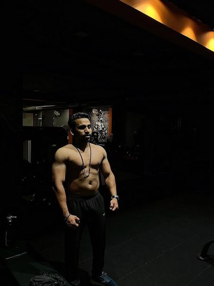 In bulking mode. This phase is about eating in a caloric surplus and training heavy to build the maximum amount of muscle before a competition prep cycle begins.