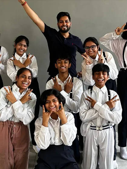 Posing with my amazing students. Seeing their happy faces and the cool poses they strike is the best reward for any choreographer.
