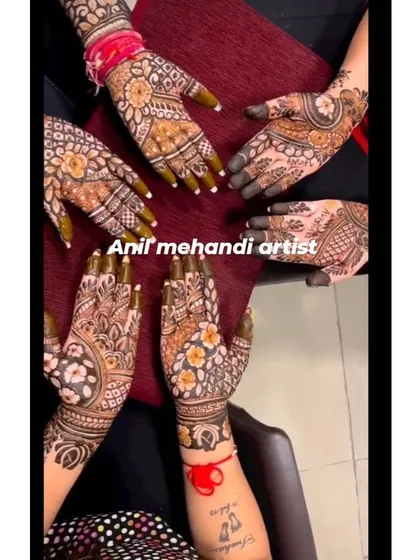 A group of happy clients showing their mehandi together. We can handle large groups for sangeet nights or mehandi parties, ensuring everyone gets a beautiful design.