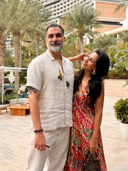 Nothing makes me happier than seeing my clients shine. Here, a favorite couple enjoys their holiday, with him wearing one of my art-detailed linen shirts. It’s art meeting fashion and finding a place in your heart.