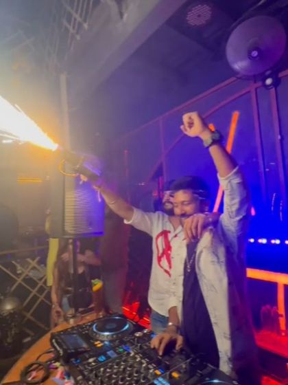 Celebrating with the crowd, sparkler gun in hand. I always get in the mix to hype everyone up.