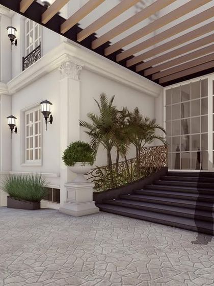 The exterior of The Clarence features soft ivory tones and classical ornamentation that give it a calming, moonlit effect. While appearing as one structure, it cleverly conceals two duplicate residences, a masterpiece of symmetrical design.