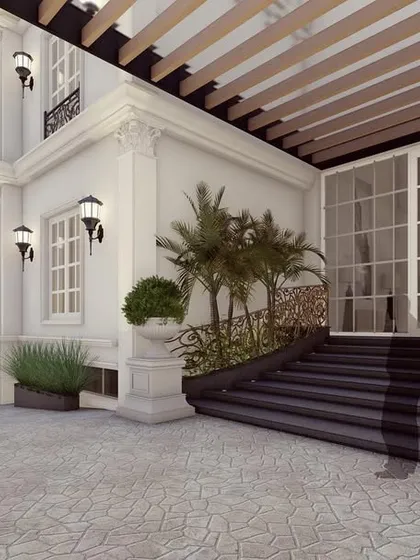 The exterior of The Clarence features soft ivory tones and classical ornamentation that give it a calming, moonlit effect. While appearing as one structure, it cleverly conceals two duplicate residences, a masterpiece of symmetrical design.